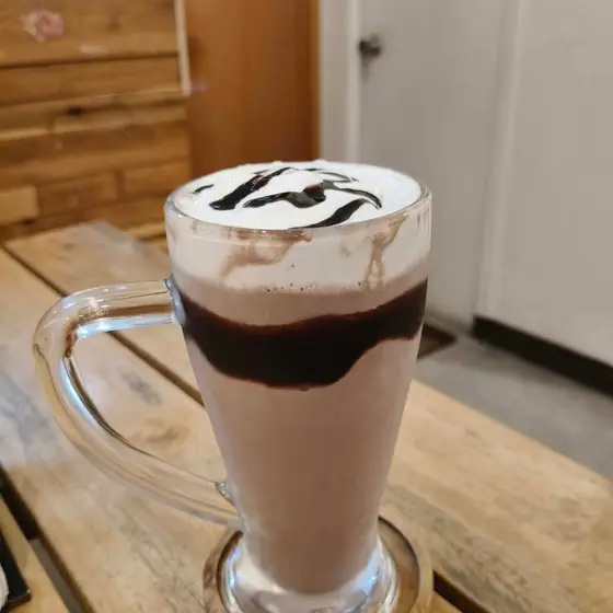 Chocolate latte with a chocolate drizzle