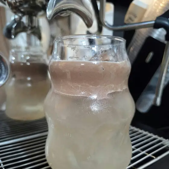 A fizz pop drink at the espresso machine