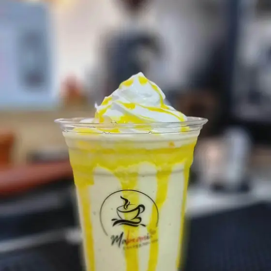 Mango frappe with whipped cream