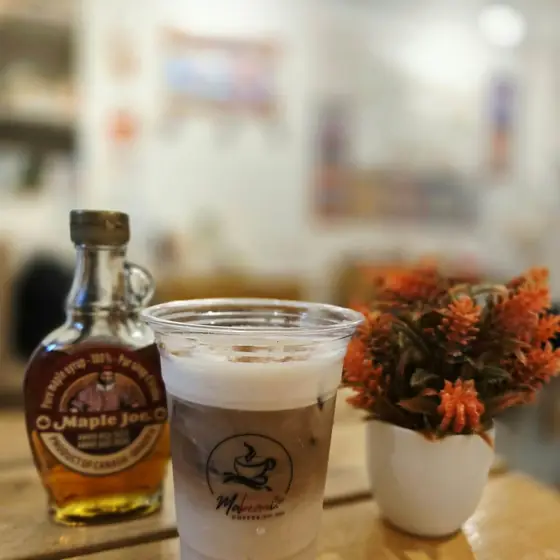 An iced latte with maple syrup