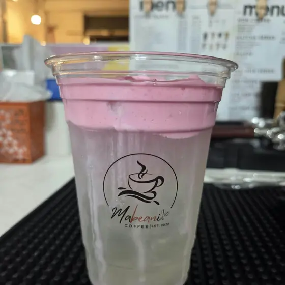 Strawberry fizz pop with pink foam
