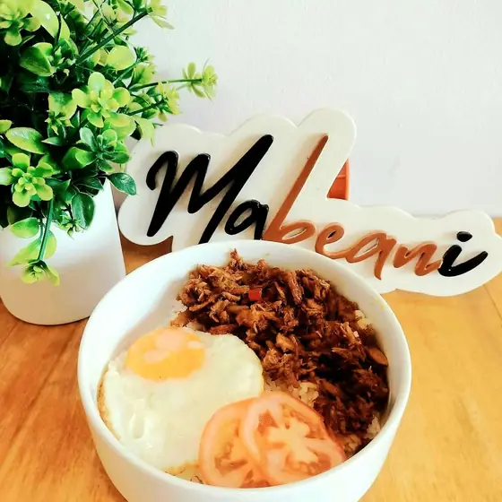 Sweet and spicy chicken pastil with egg and tomato