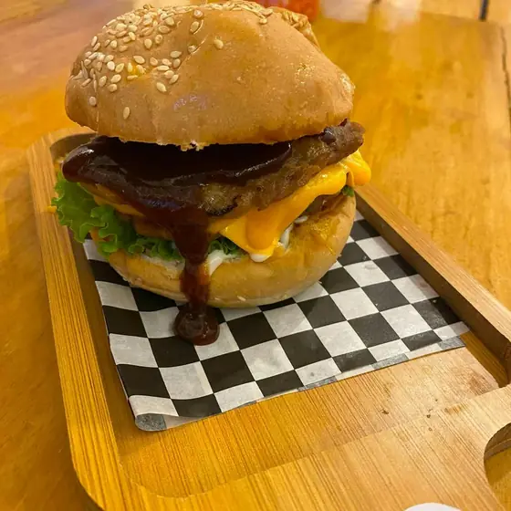 Single Stacker beef burger with cheese and BBQ sauce